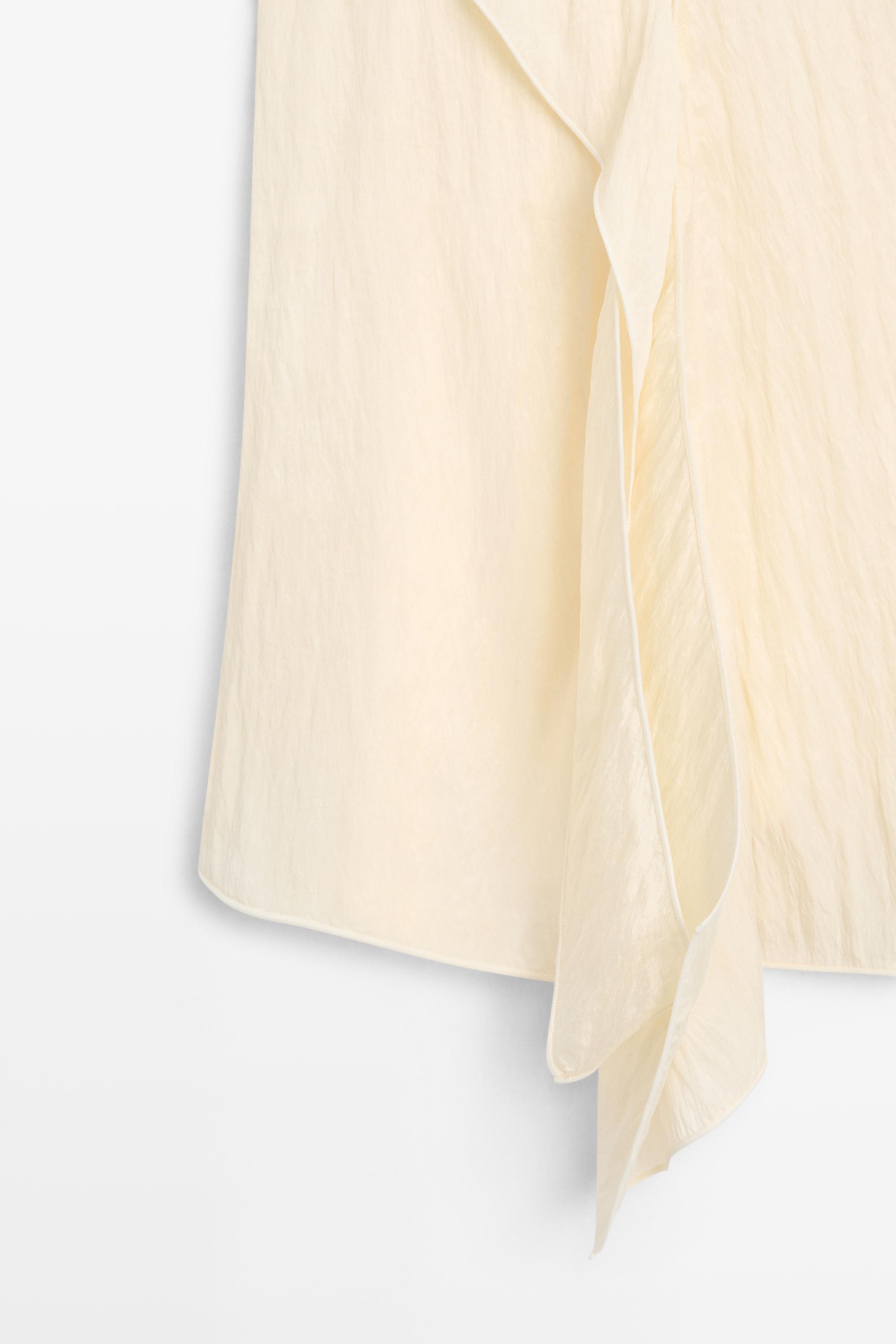 Strappy top with ruffle detail